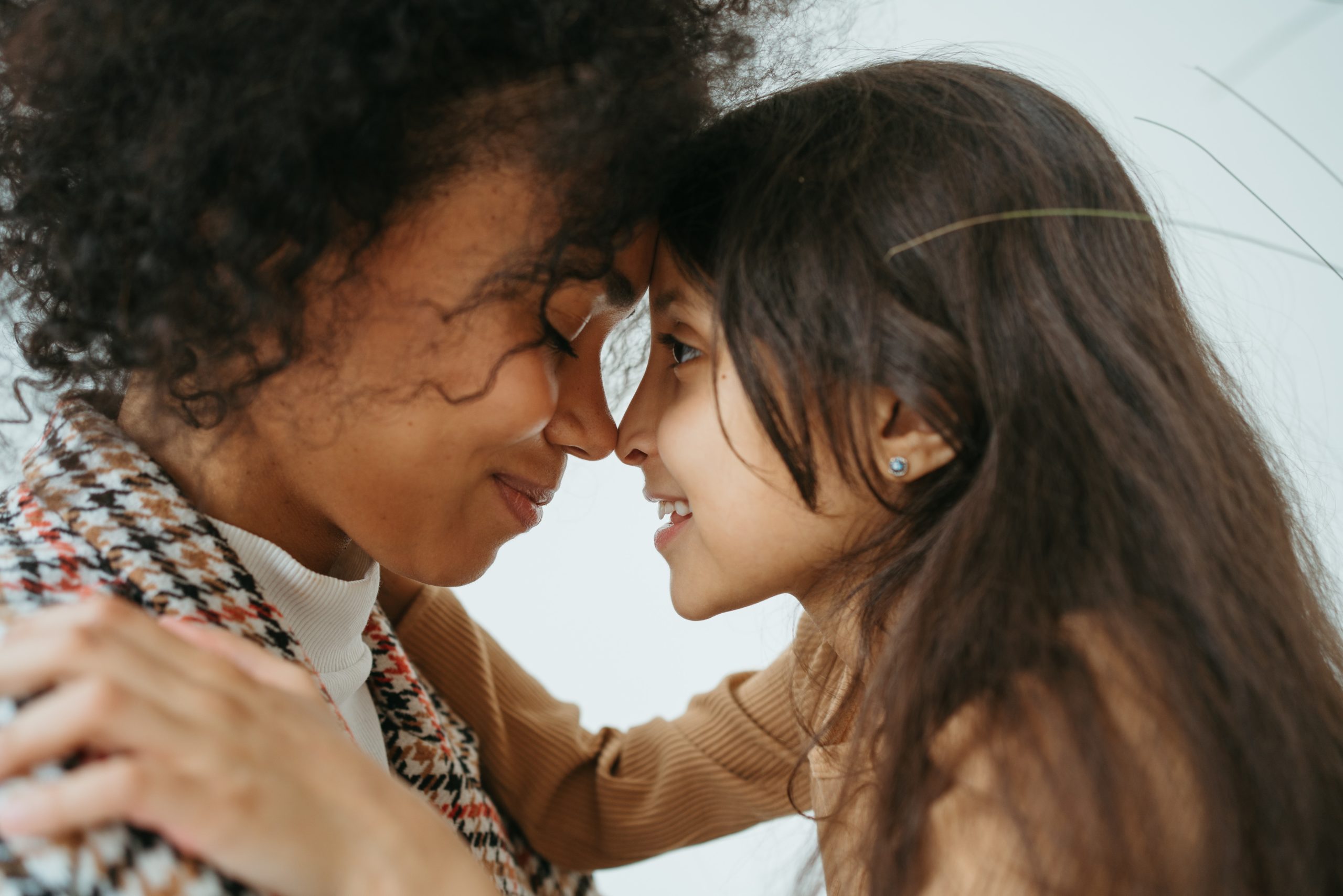 Two people in a warm therapy conversation
